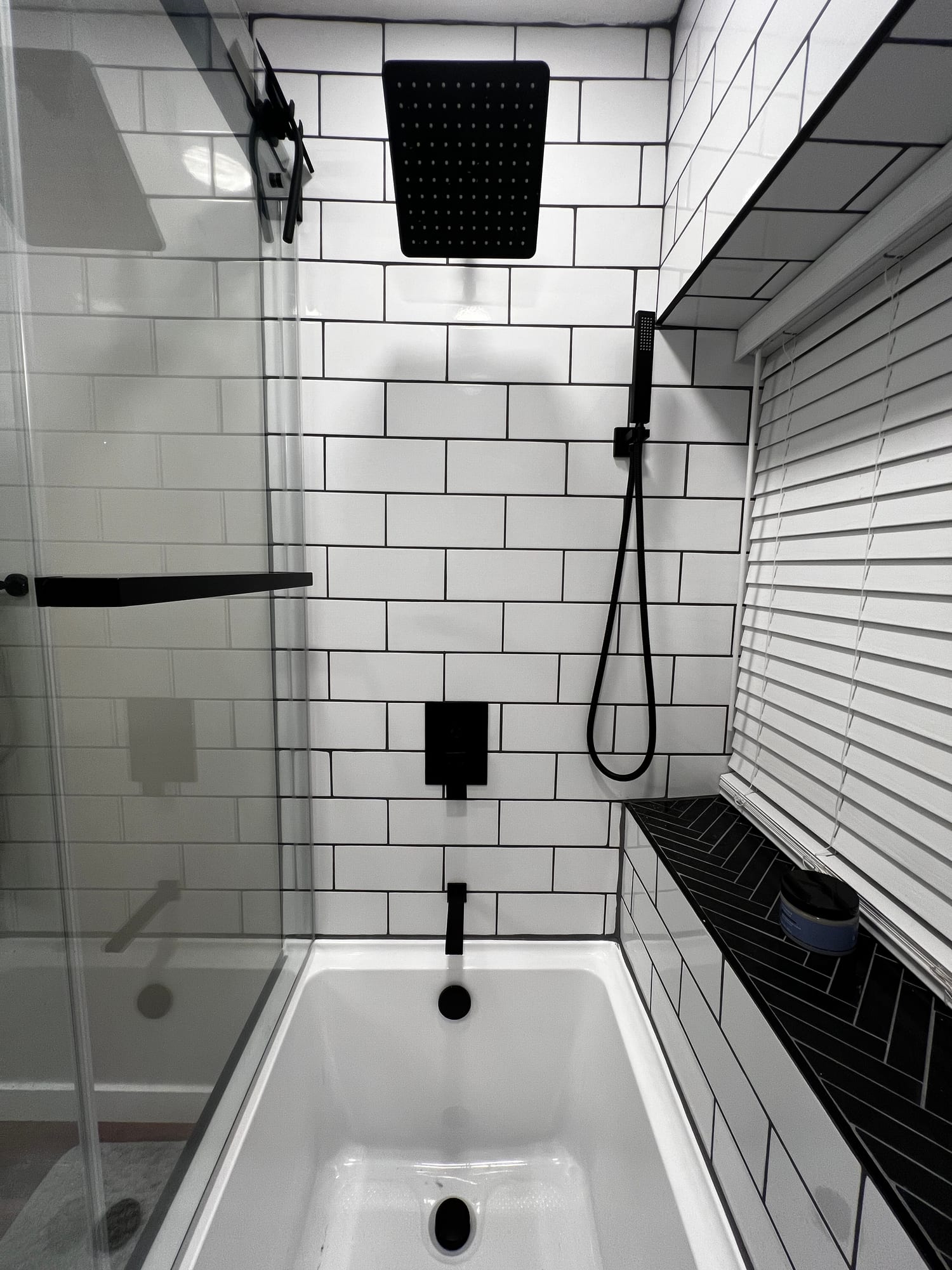 Walk-in shower with matte-black fixtures
