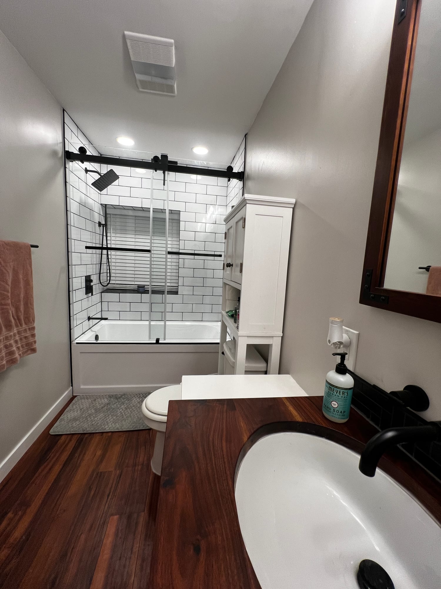 Bathroom with walk-in shower and custom vanity